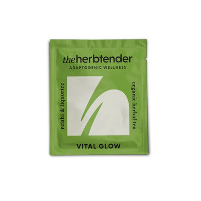 Green tea package with 'the herbtender' branding on a white background
