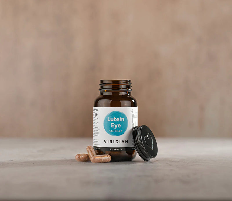 Brown supplement bottle labeled &
