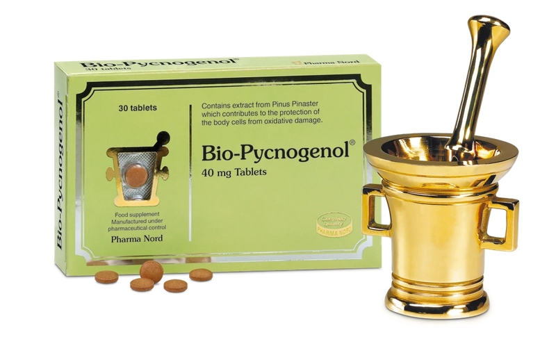 Bio-Pycnogenol packaging with tablets and a gold mortar and pestle on a white background