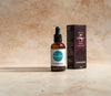 Viridian Organic Repair 5 Serum bottle and box on a wooden surface